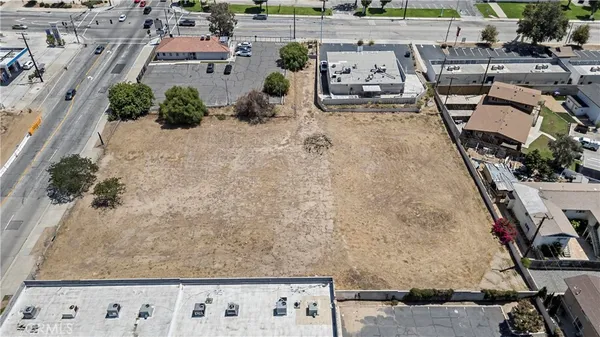 an aerial view of a yard with seating space