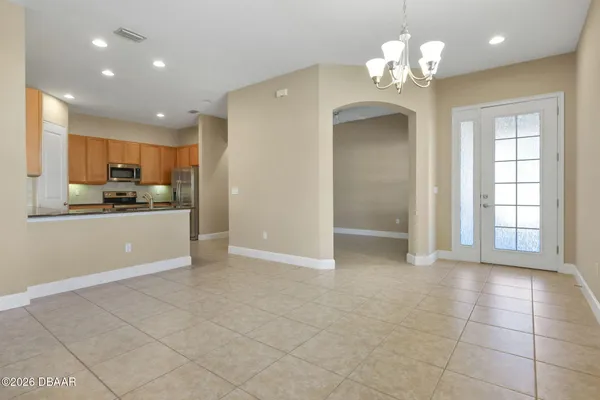 a view of a kitchen with a stove cabinets and a kitchen