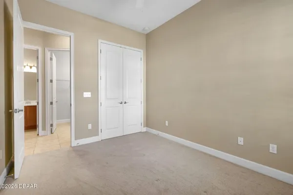 wooden floor and closet in a room