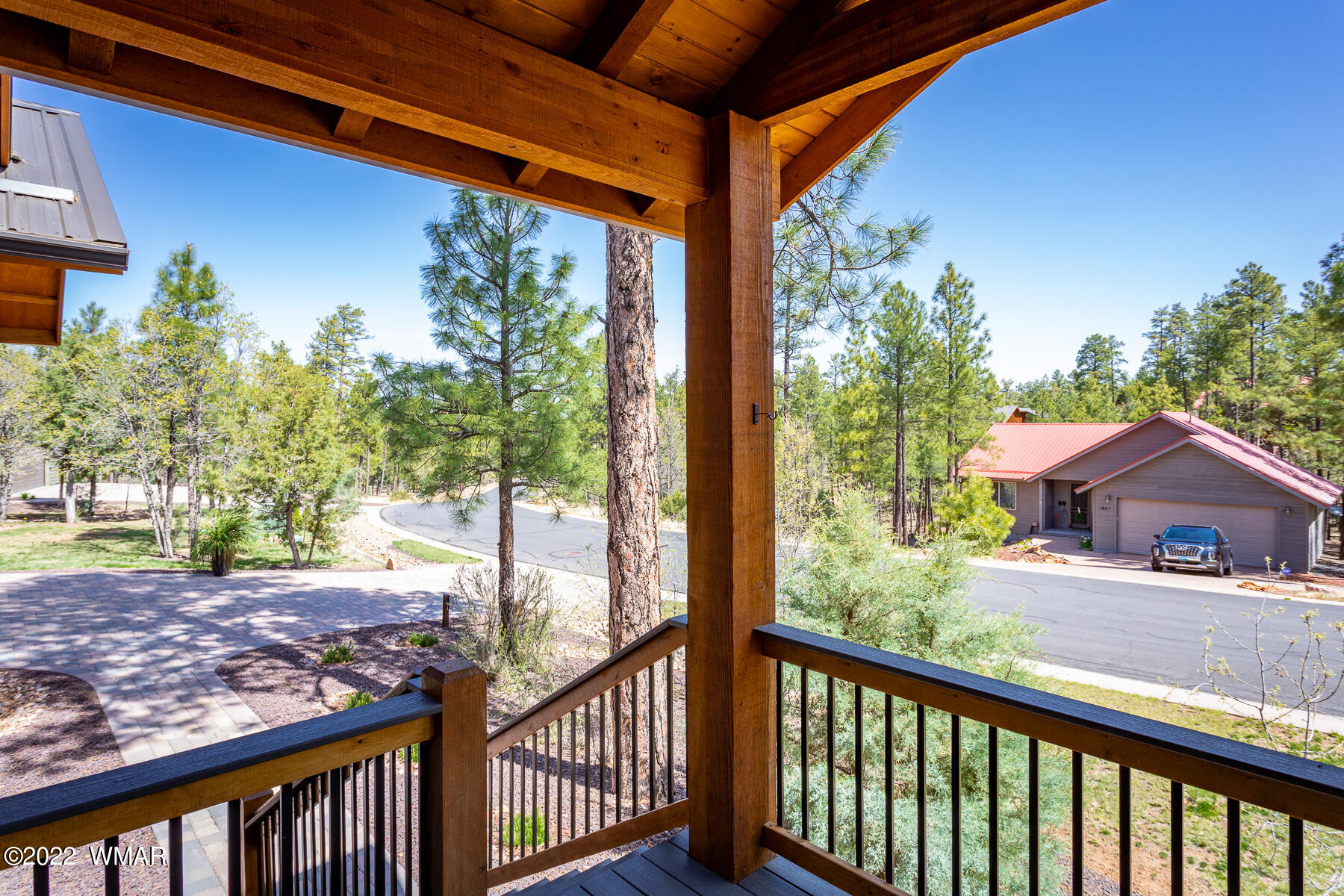 1950 Silver Tree Lane Show Low, AZ 85901 - Photo 11 of 41 a view of a porch with a yard