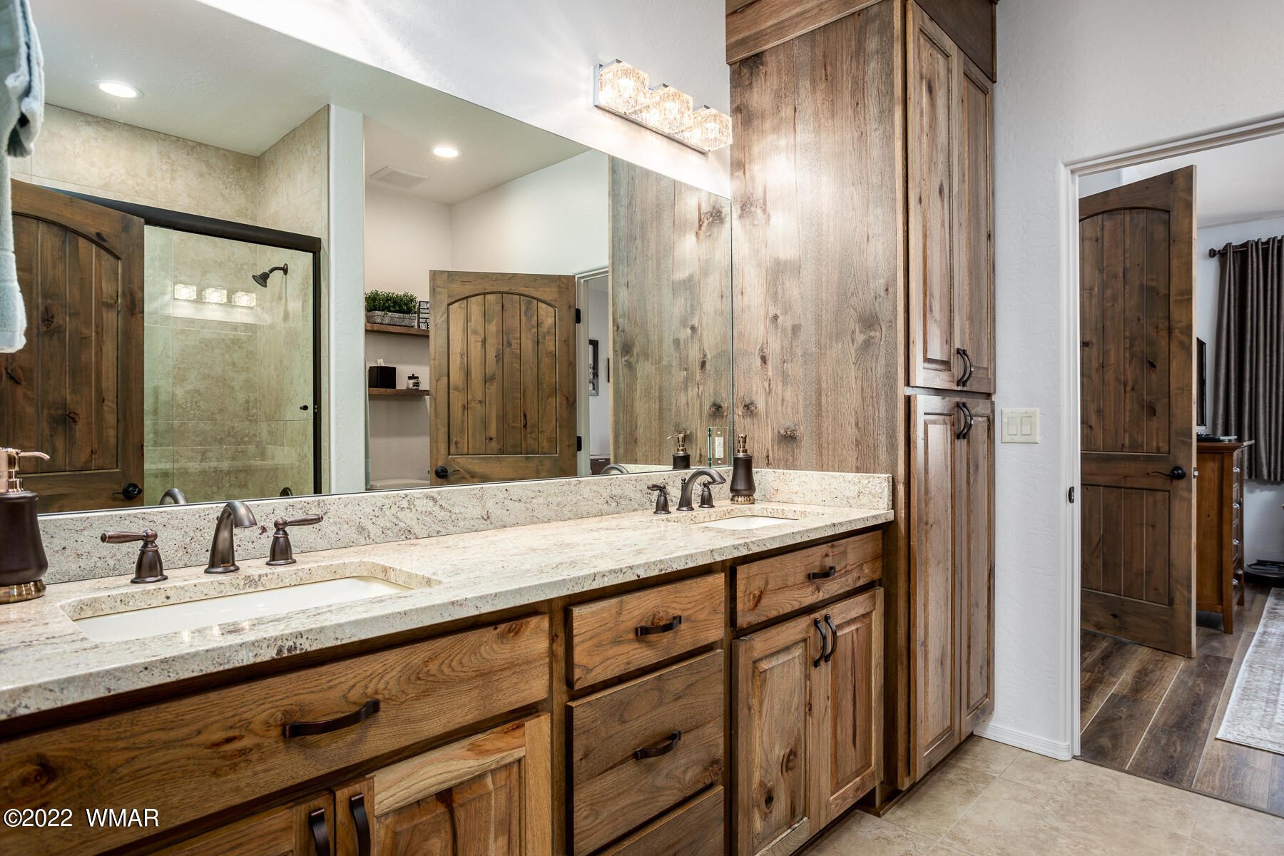 1950 Silver Tree Lane Show Low, AZ 85901 - Photo 24 of 41 a bathroom with a double vanity sink a and mirror