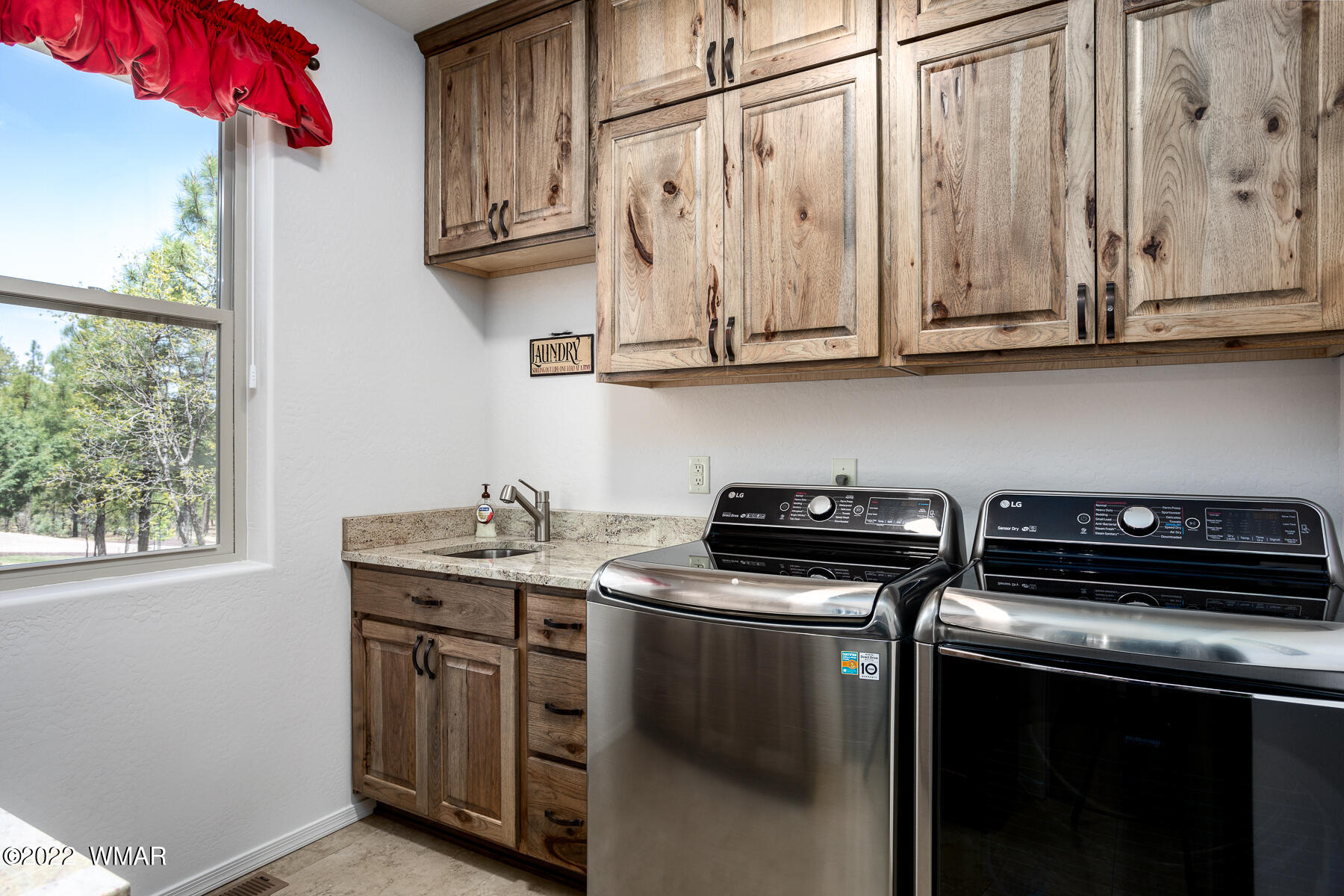 1950 Silver Tree Lane Show Low, AZ 85901 - Photo 27 of 41 a kitchen with stainless steel appliances granite countertop a stove a sink and a microwave