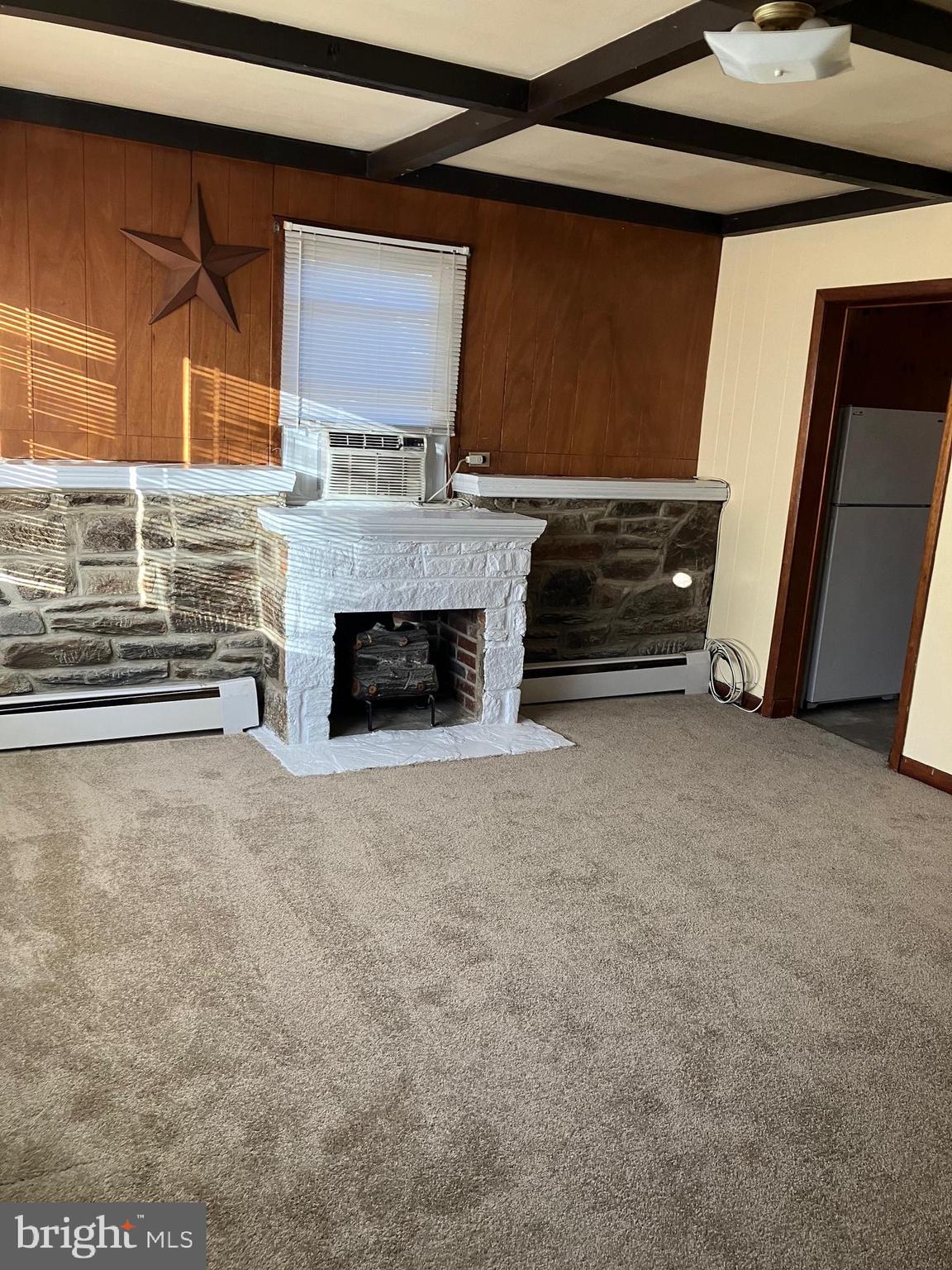 1028 Mantua Pike, Unit D Wenonah, NJ 08090 - Photo 3 of 10 a living room with furniture and a fireplace