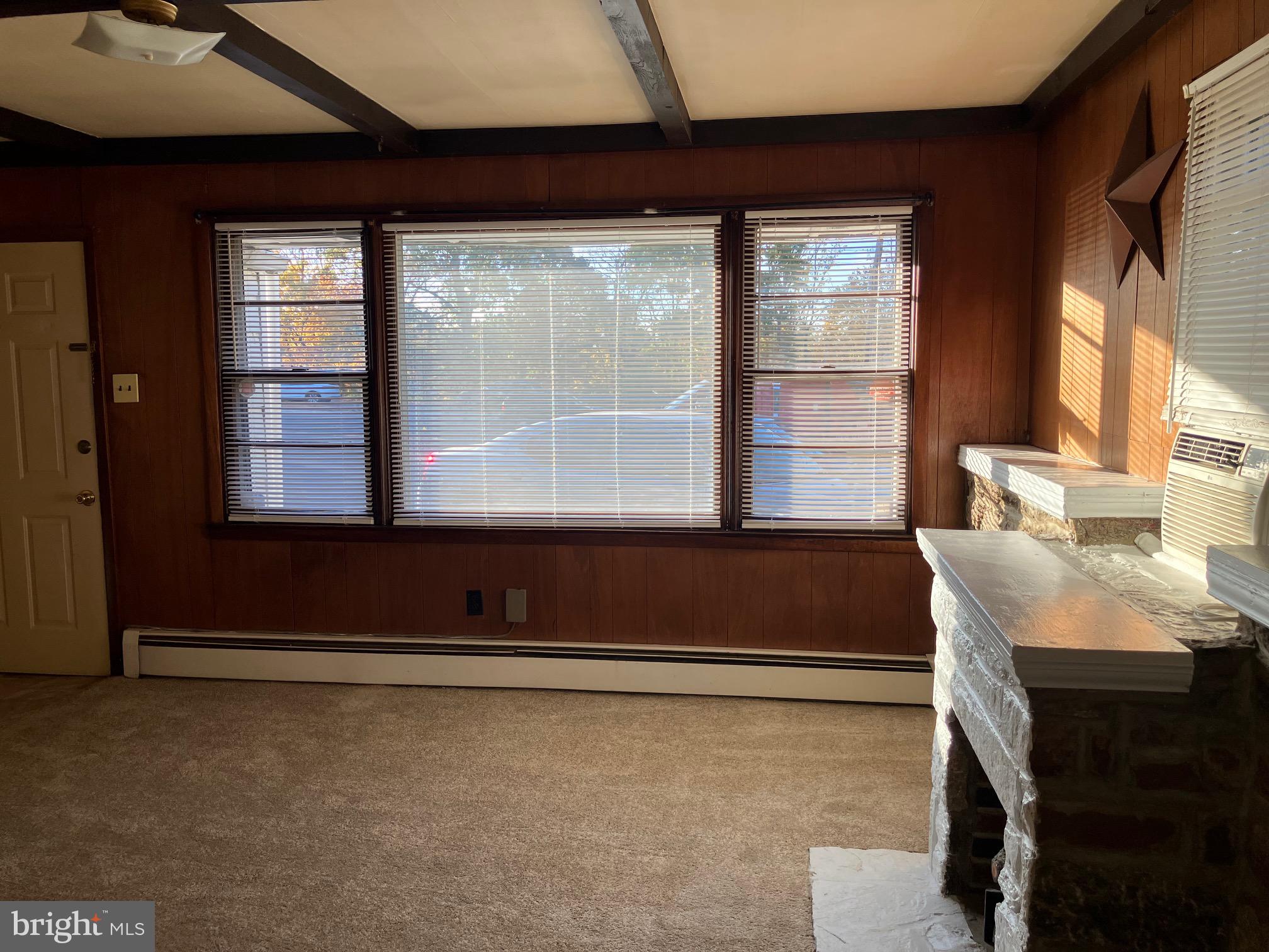 1028 Mantua Pike, Unit D Wenonah, NJ 08090 - Photo 4 of 10 a living room with a large window