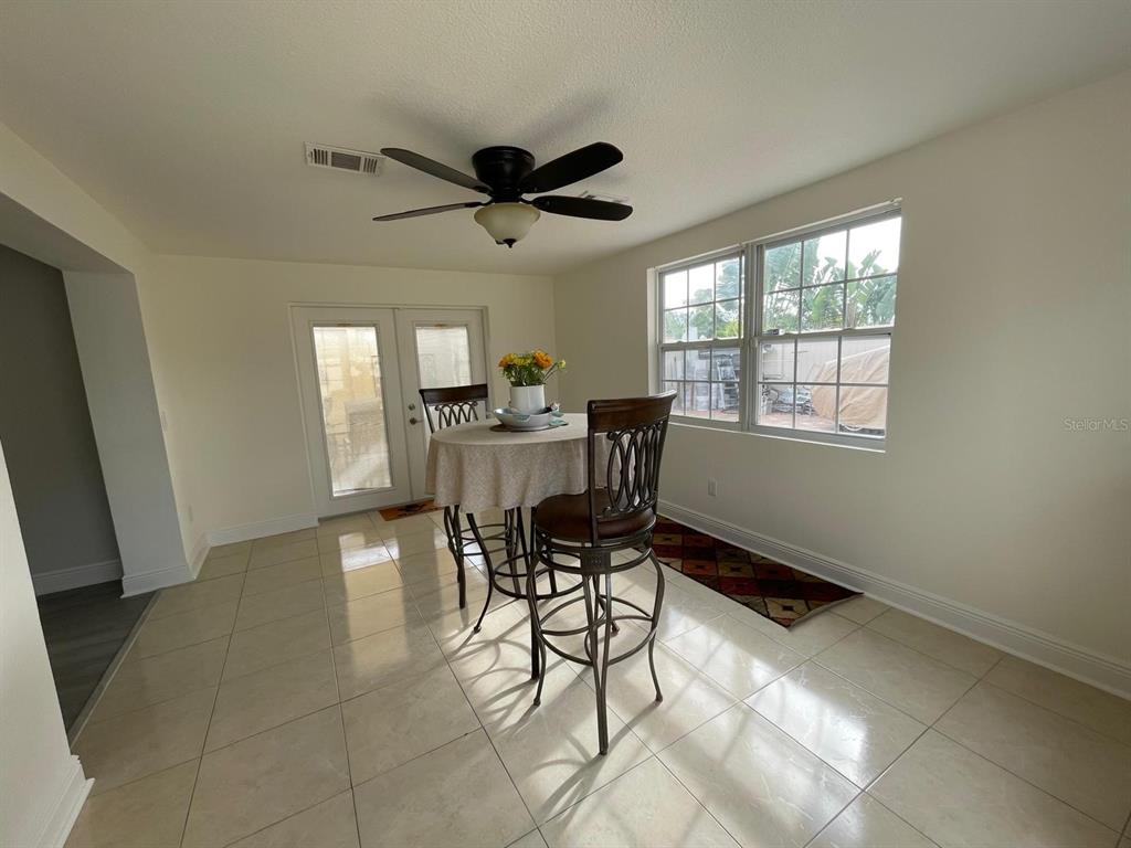 6314 Seabreeze Drive Port Richey, FL 34668 - Photo 14 of 46 a workspace with furniture and window