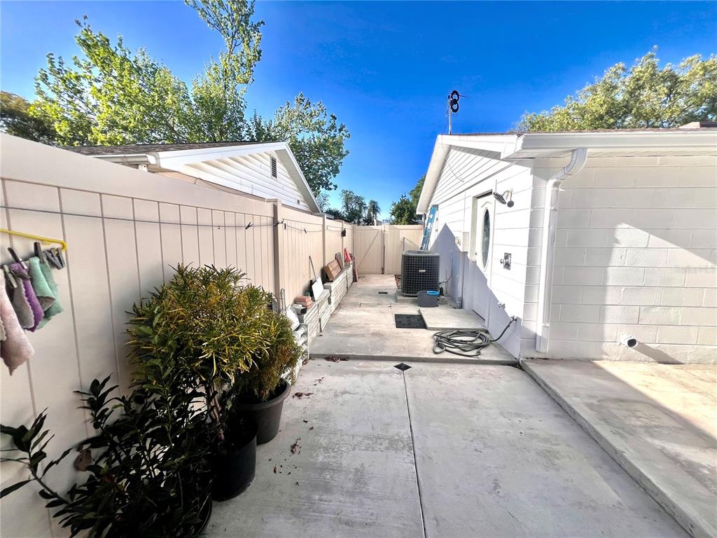 6314 Seabreeze Drive Port Richey, FL 34668 - Photo 28 of 46 a view of a backyard with sitting area