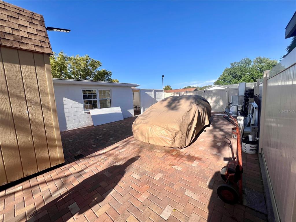 6314 Seabreeze Drive Port Richey, FL 34668 - Photo 32 of 46 a view of a house with backyard and sitting area