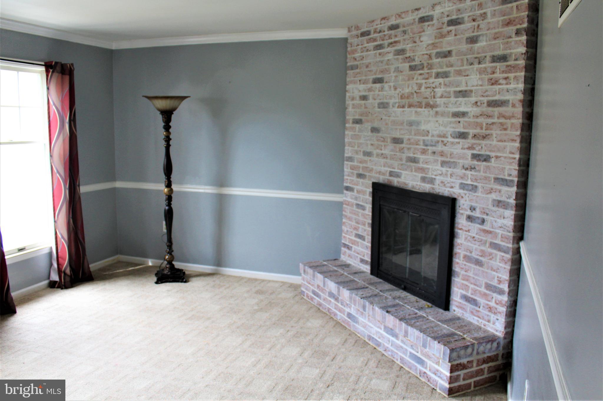 4335 Stoudts Ferry Bridge Road Reading, PA 19605 - Photo 5 of 29 LIVING ROOM AND FIREPLACE