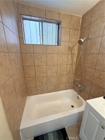 a bathroom with a bath tub