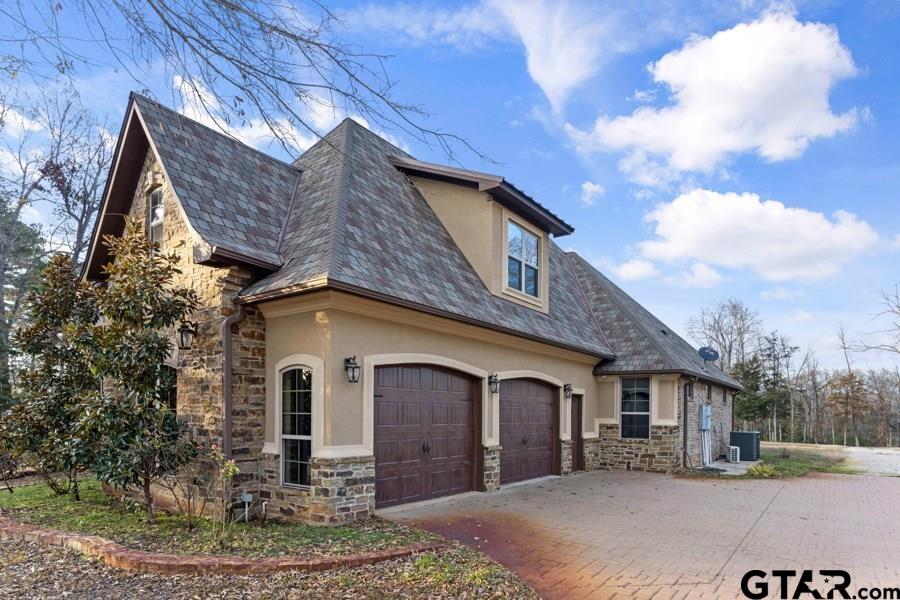 11378 Highway 110 Tyler, TX 75704 - Photo 34 of 42 a front view of a house with a yard