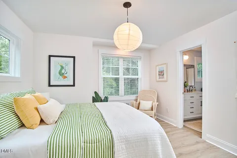 a view of a bedroom with a bed
