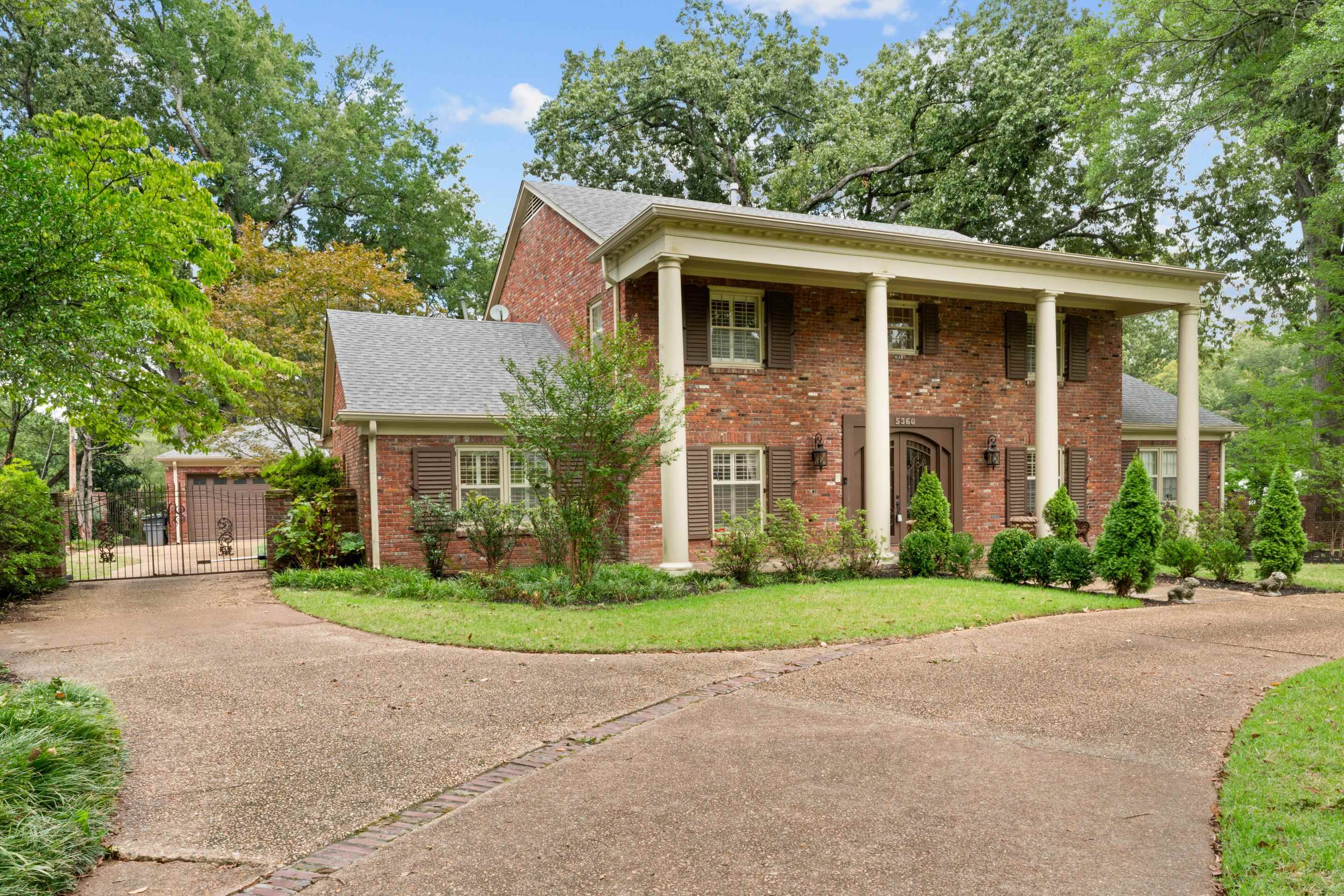 5360 Normandy Road Memphis, TN 38120 - Photo 2 of 40 a front view of house with yard and green space