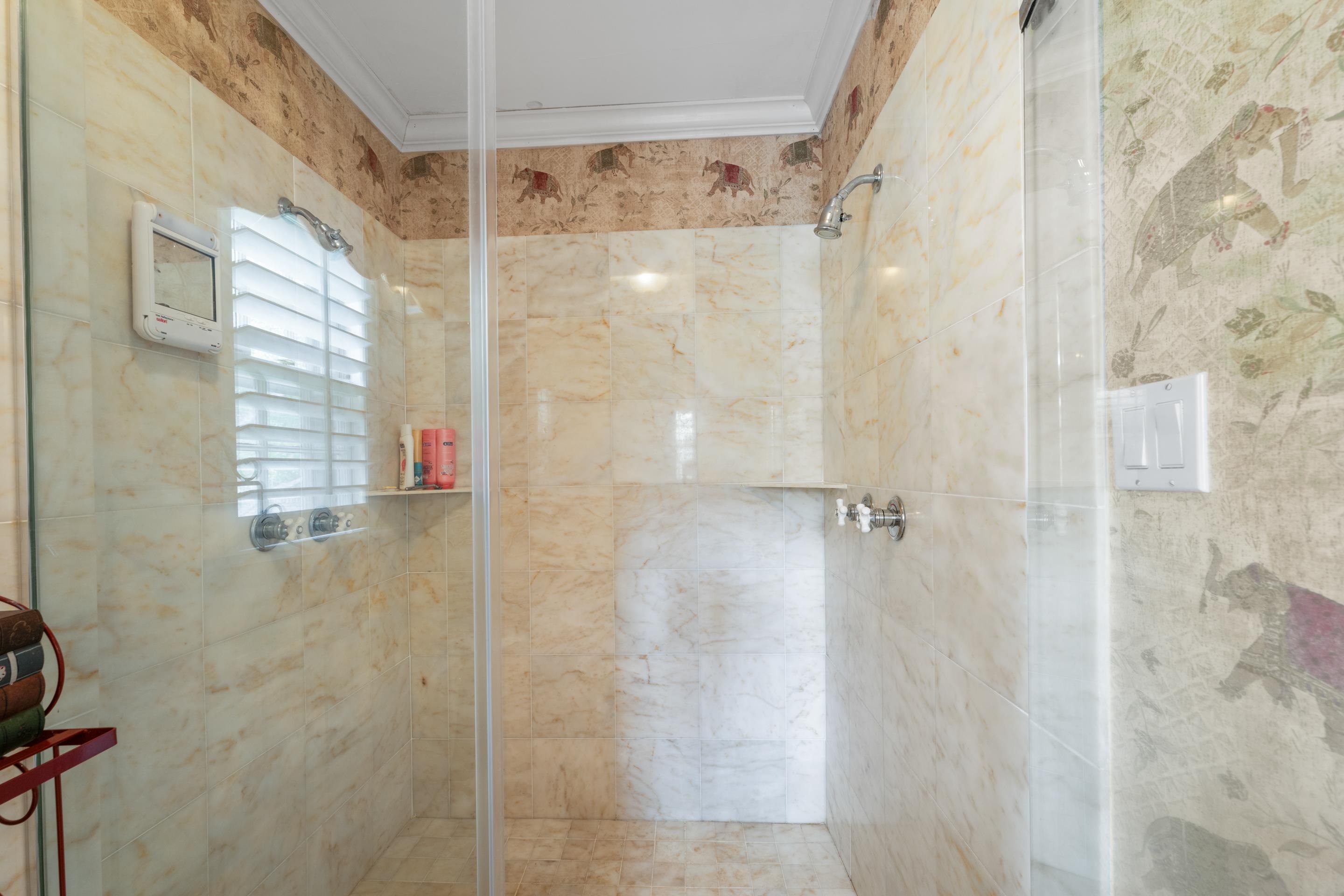 5360 Normandy Road Memphis, TN 38120 - Photo 32 of 40 a bathroom with a shower