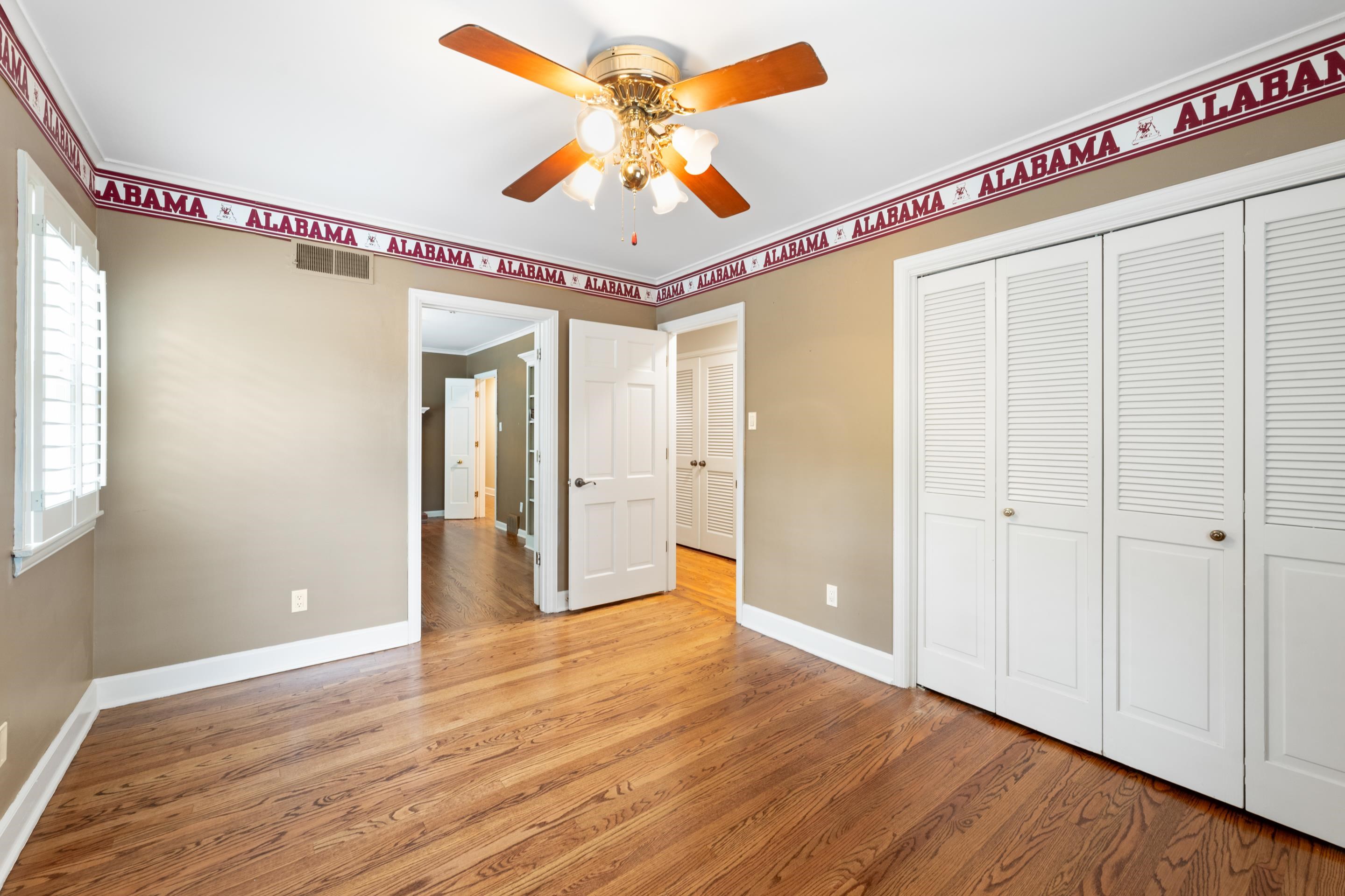 5360 Normandy Road Memphis, TN 38120 - Photo 37 of 40 a view of a hallway with wooden floor