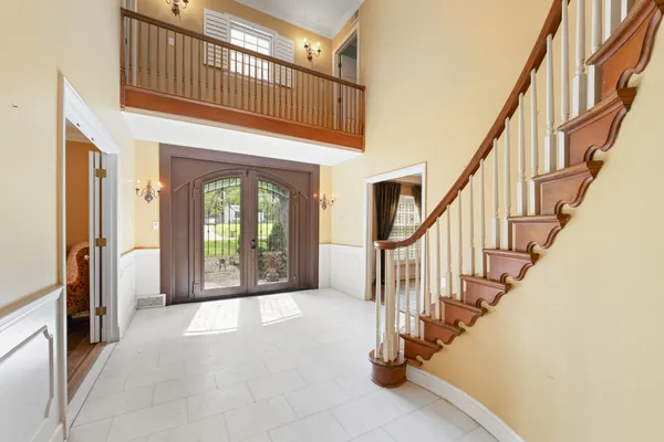a view of an entryway with staircase