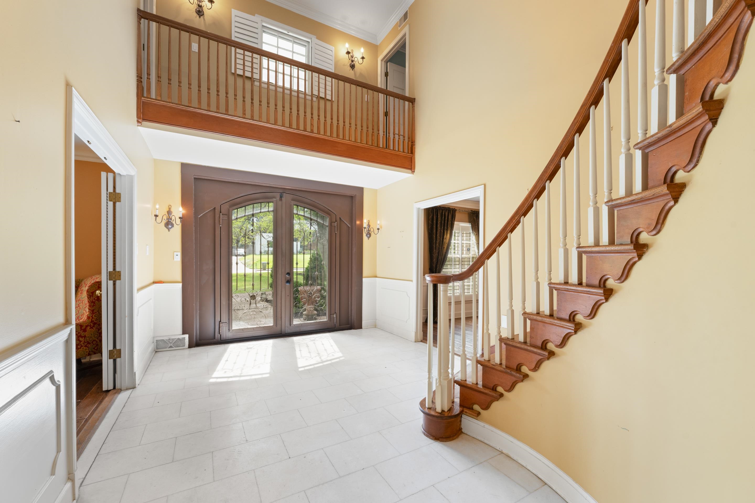 5360 Normandy Road Memphis, TN 38120 - Photo 4 of 40 a view of an entryway with staircase