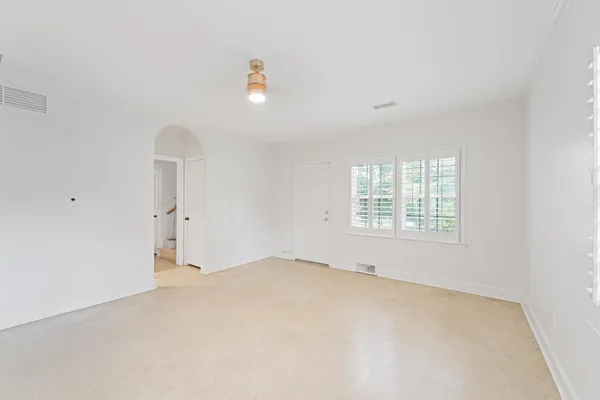 an empty room with windows