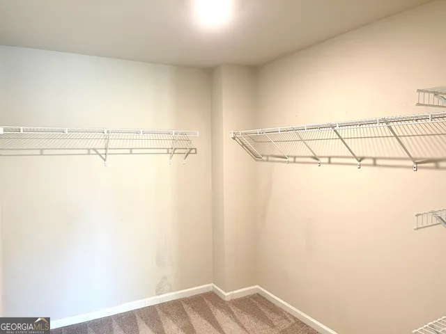 a view of a room with racks on the wall