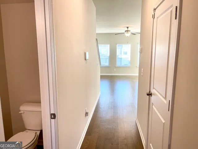 a bathroom with a vanity and a toilet