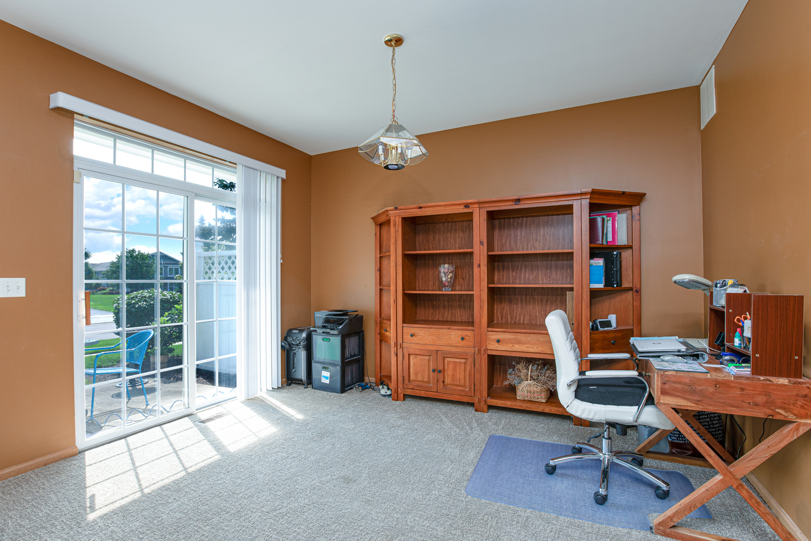 206 Brompton Lane, Unit A Sugar Grove, IL 60554 - Photo 6 of 17 a workspace with furniture and windows