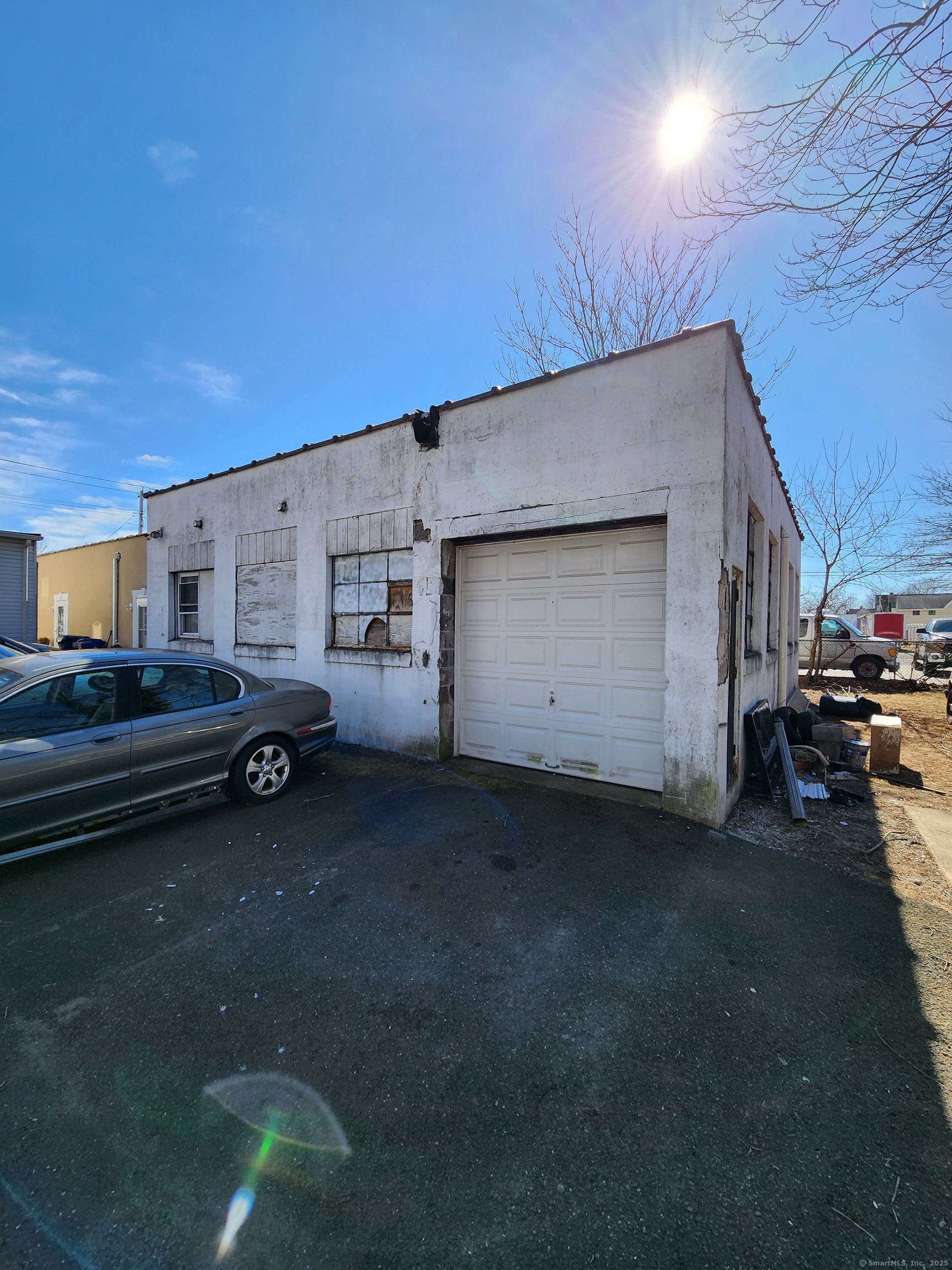 202 Campbell Avenue West Haven, CT 06516 - Photo 4 of 5 a view of a car garage