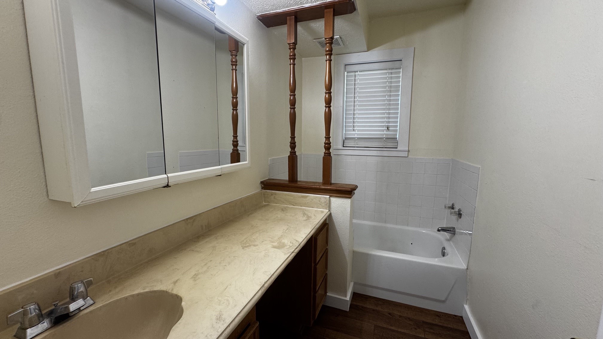 30827 Burton Cemetery Road Waller, TX 77484 - Photo 11 of 19 a bathroom with a granite countertop sink and a bathtub