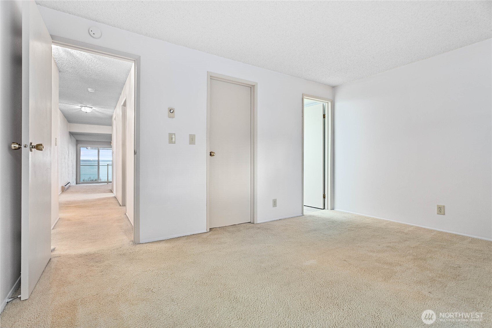 600 South State Street, Unit 208 Bellingham, WA 98225 - Photo 20 of 34 an empty room with window in back and closet area