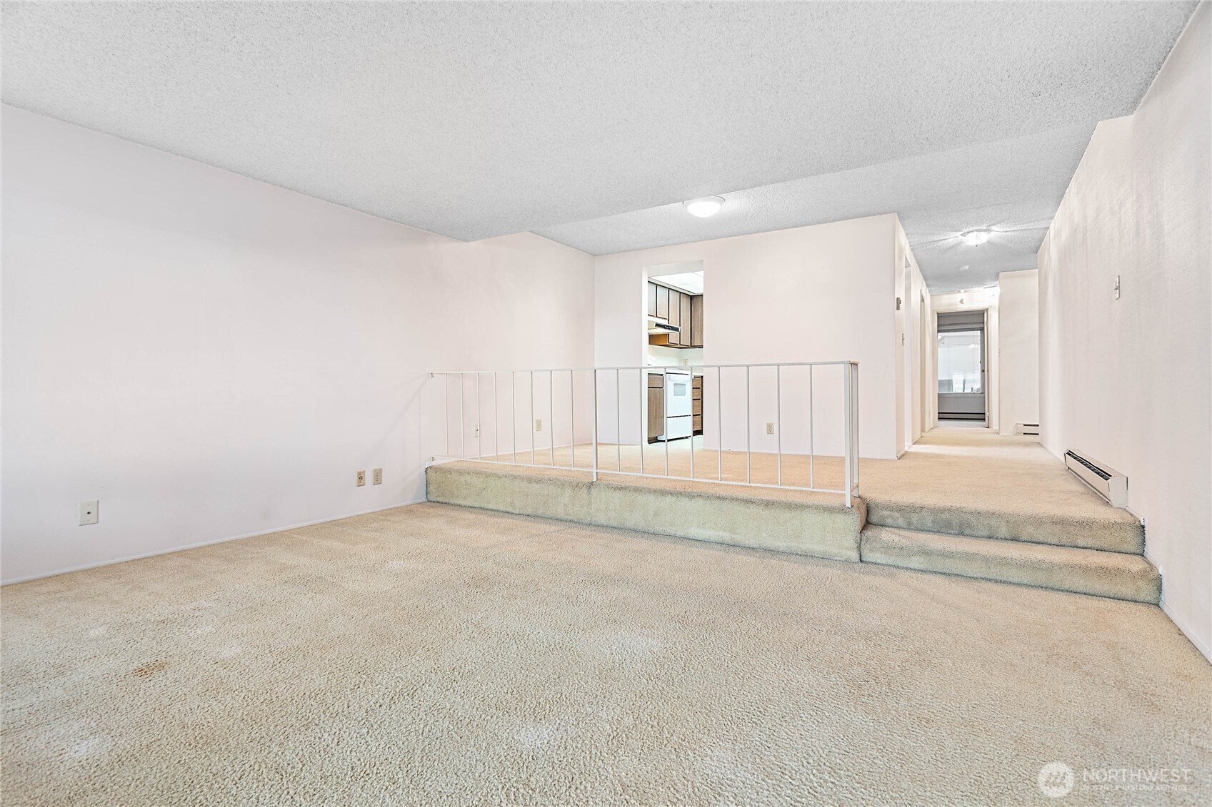 600 South State Street, Unit 208 Bellingham, WA 98225 - Photo 3 of 34 an empty room with a fireplace