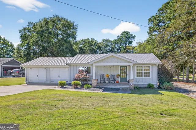 a front view of a house with patio