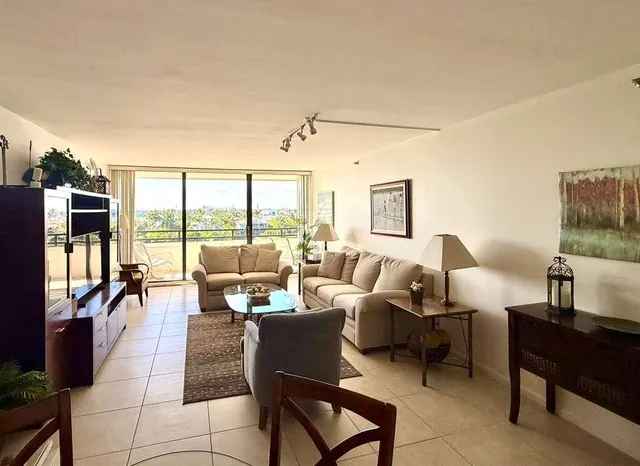 a front view of a livingroom with furniture