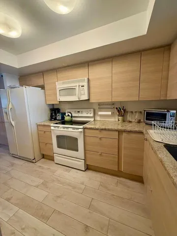 a view of a elevator and a mirror