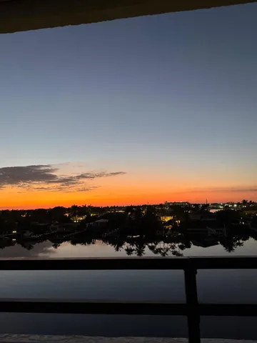 a view of a lake with a city