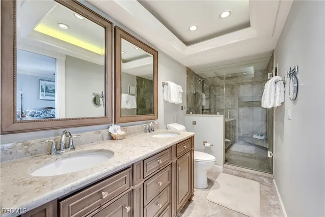 a bedroom with a bed window and a table