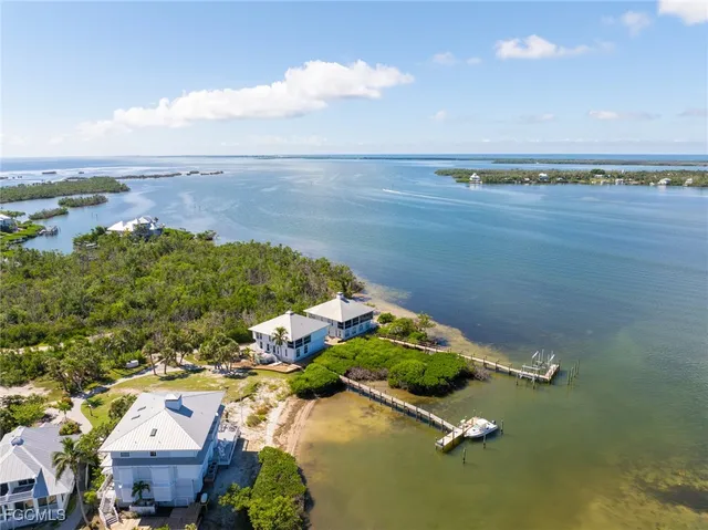 an aerial view of a city with lawn chairs