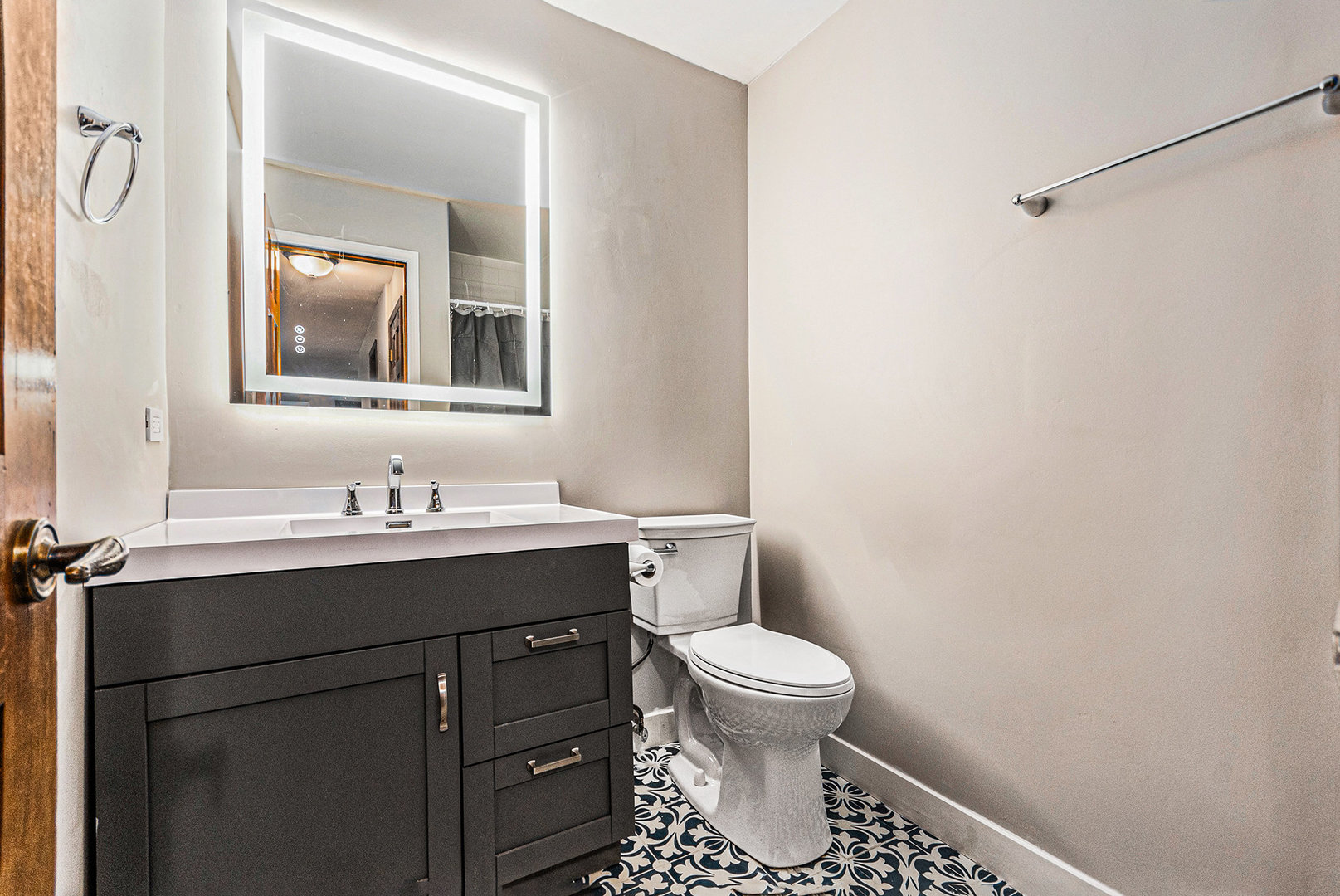 3942 Broadmoor Circle Naperville, IL 60564 - Photo 11 of 25 a bathroom with a toilet sink and mirror