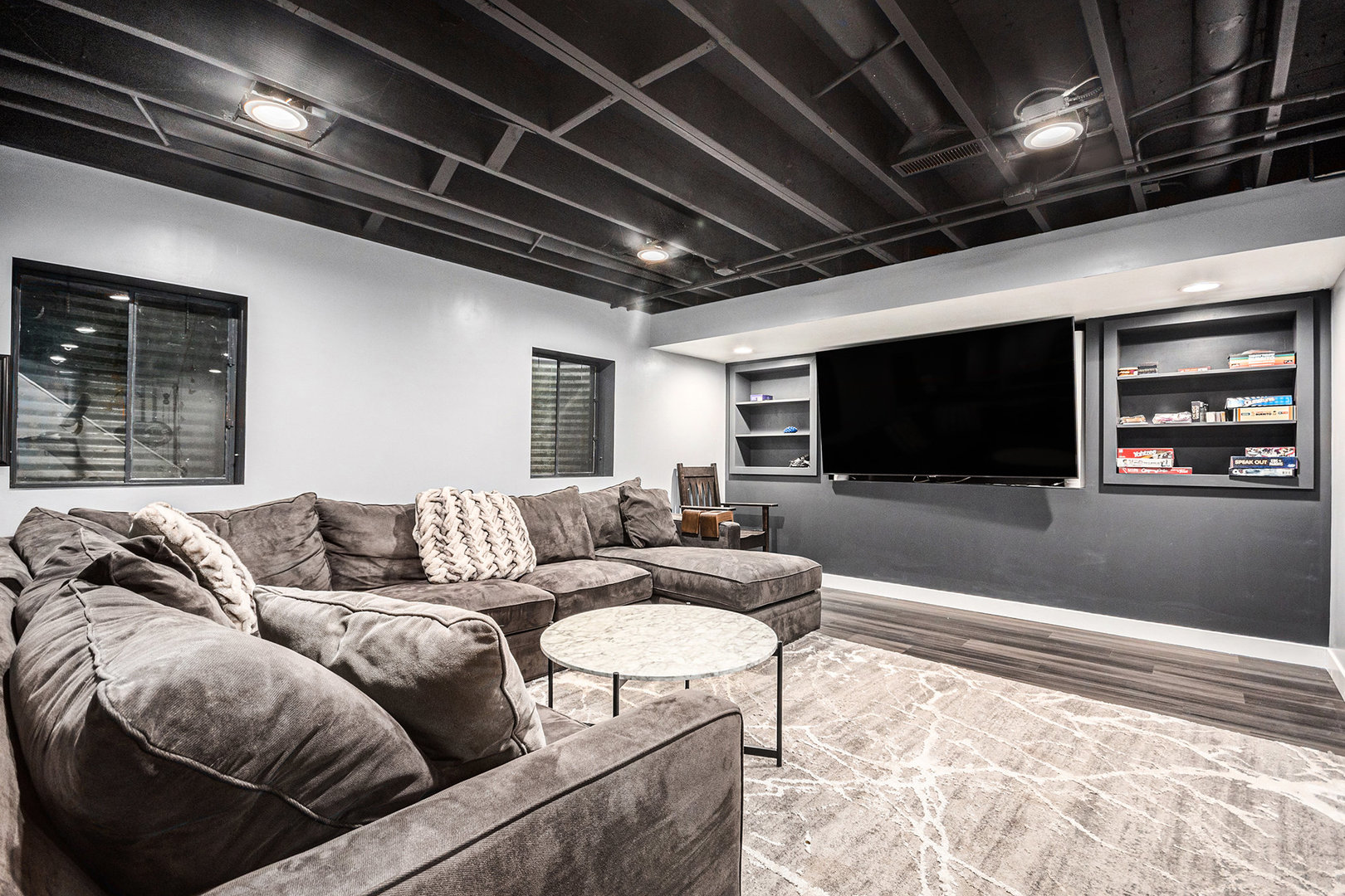 3942 Broadmoor Circle Naperville, IL 60564 - Photo 20 of 25 a living room with furniture and a flat screen tv