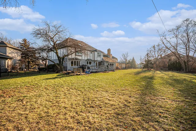 a view of a swimming pool with an outdoor space and seating area