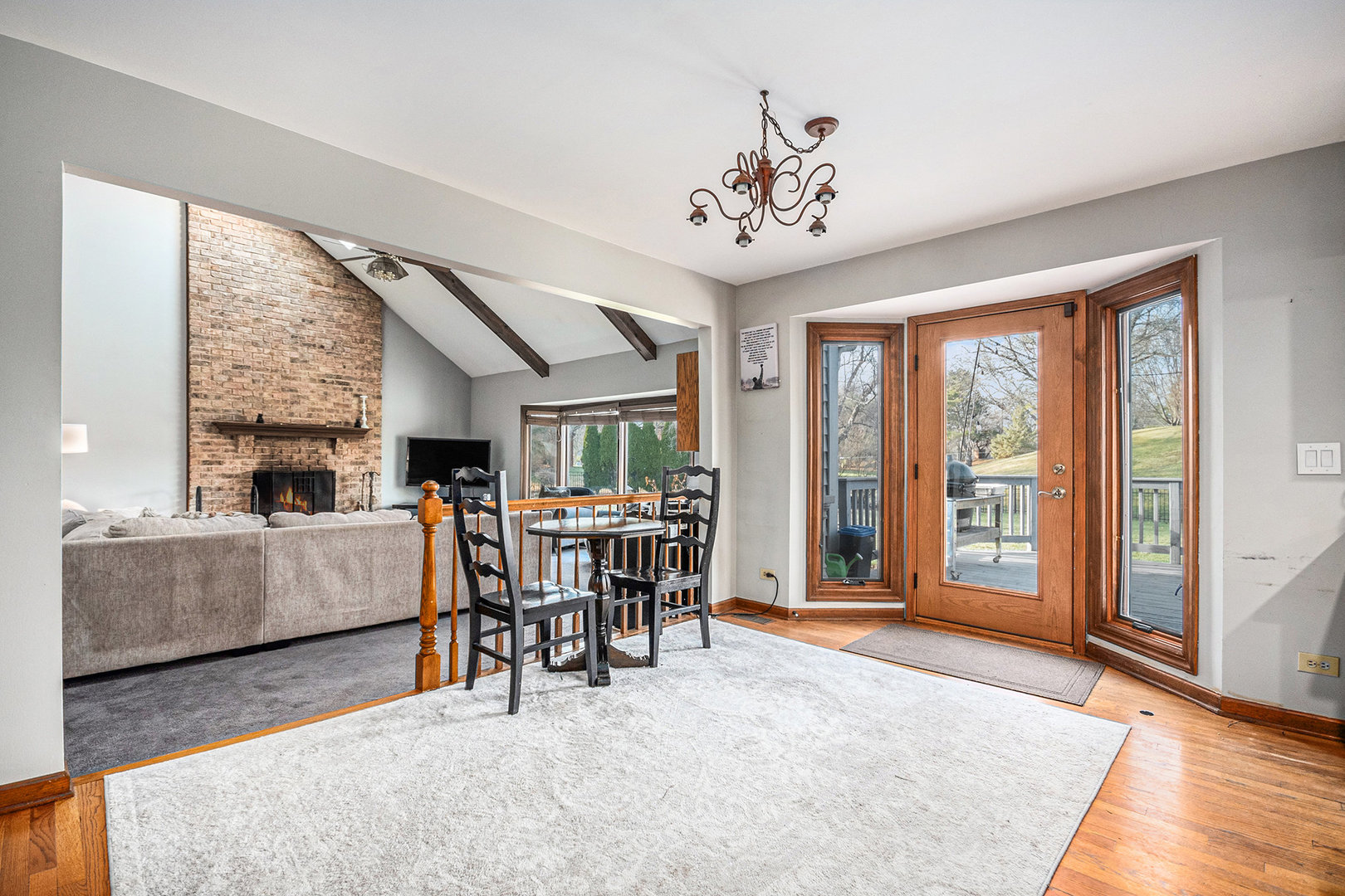 3942 Broadmoor Circle Naperville, IL 60564 - Photo 4 of 25 a living room with furniture and a large window