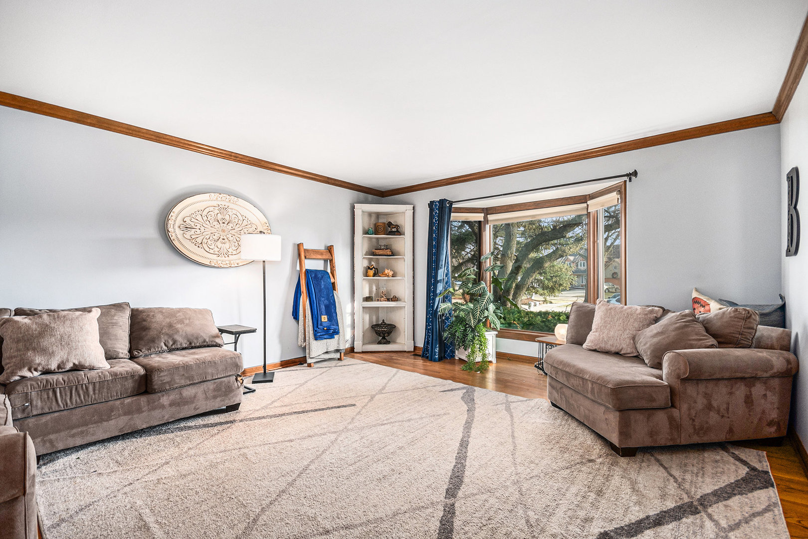 3942 Broadmoor Circle Naperville, IL 60564 - Photo 5 of 25 a living room with furniture and a large window