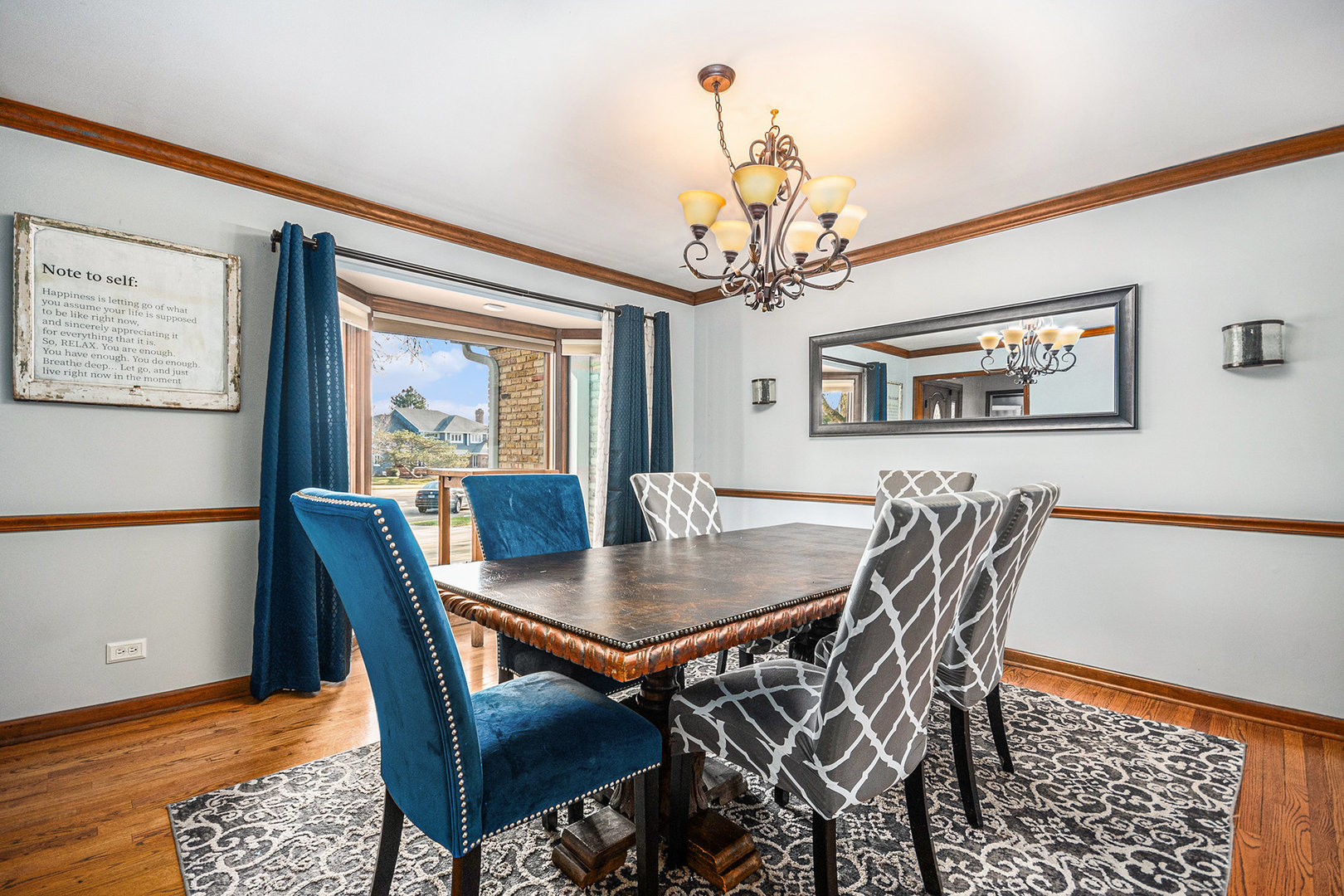 3942 Broadmoor Circle Naperville, IL 60564 - Photo 6 of 25 a view of a dining room with furniture window and wooden floor