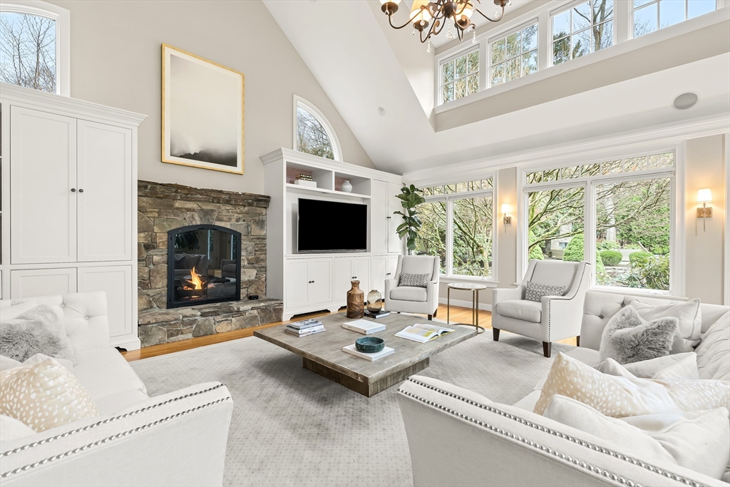 27 Radcliffe Road Wellesley, MA 02482 - Photo 3 of 38 a living room with furniture fireplace and a flat screen tv