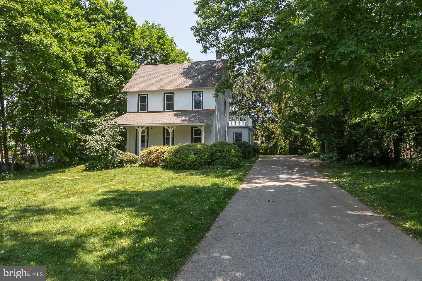 337 Righters Mill Road Gladwyne, PA 19035 - Photo 2 of 41 a front view of a house with a yard
