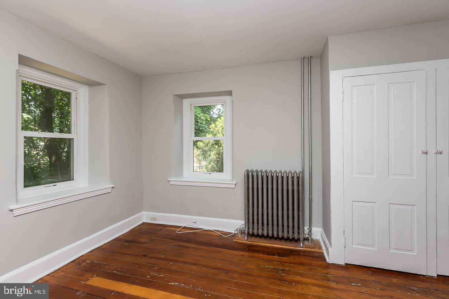 337 Righters Mill Road Gladwyne, PA 19035 - Photo 13 of 41 a view of empty room with wooden floor and fan