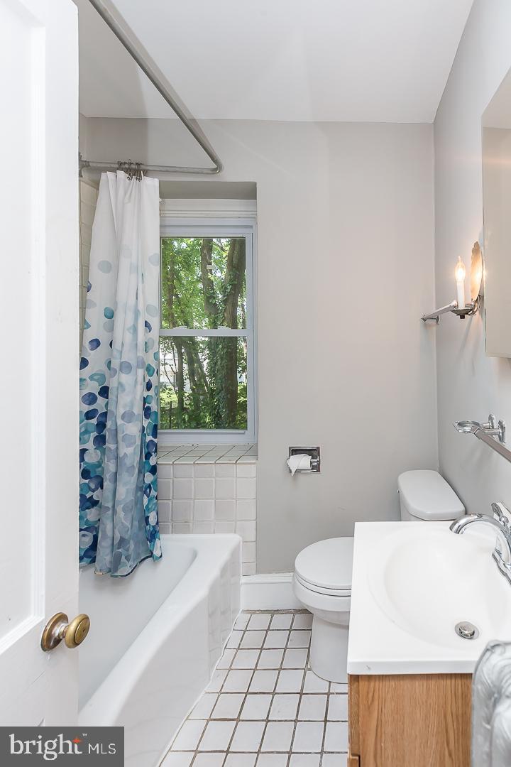 337 Righters Mill Road Gladwyne, PA 19035 - Photo 20 of 41 a bathroom with a sink a toilet and tub