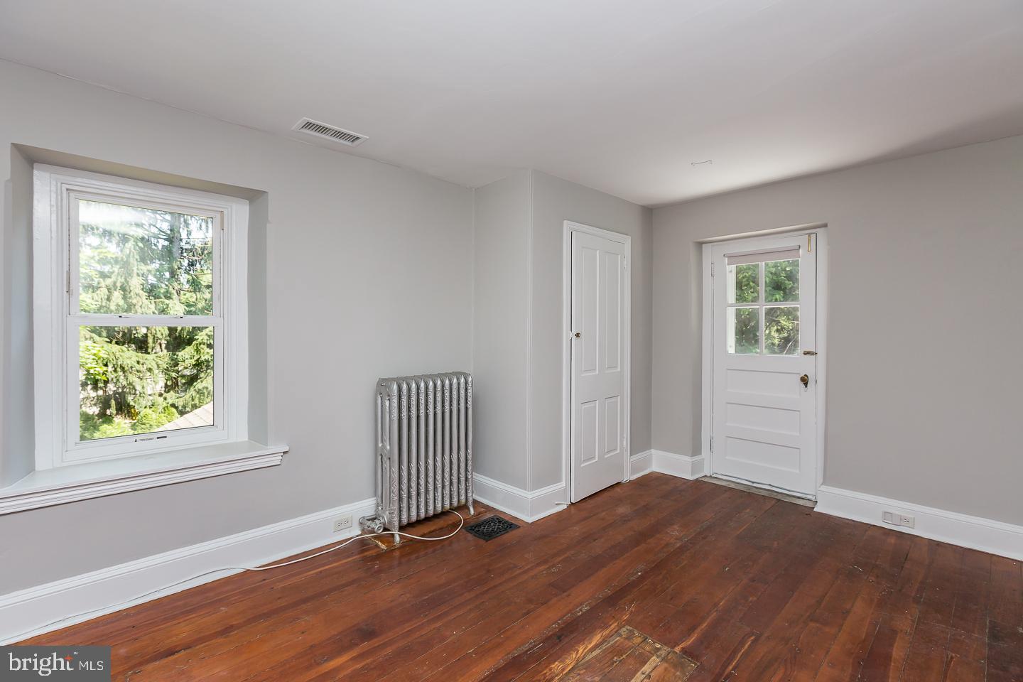 337 Righters Mill Road Gladwyne, PA 19035 - Photo 24 of 41 a view of empty room with wooden floor and fan