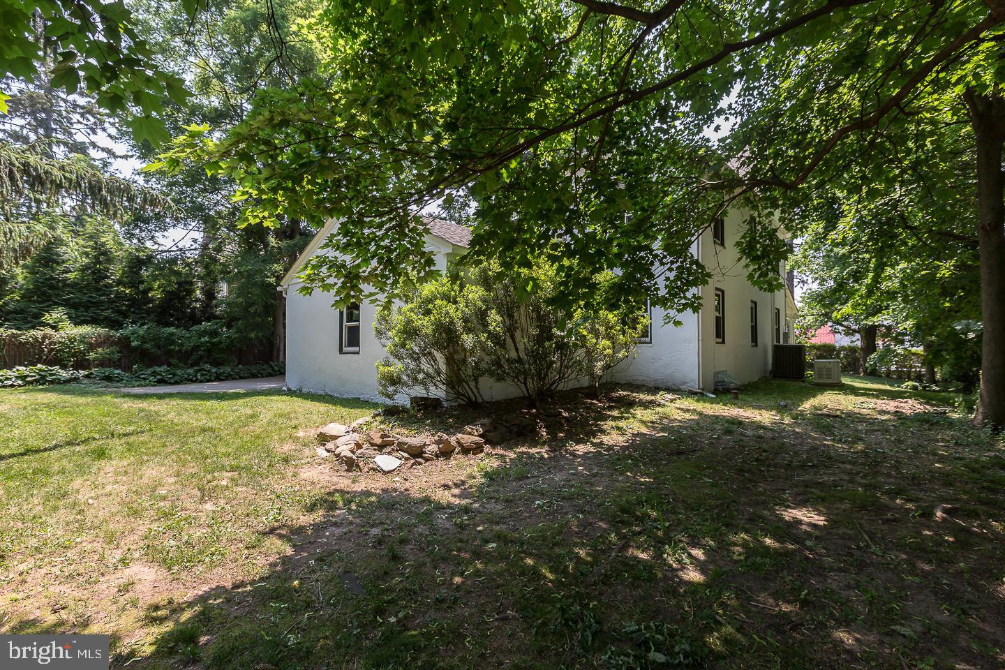337 Righters Mill Road Gladwyne, PA 19035 - Photo 38 of 41 a view of a backyard with large trees