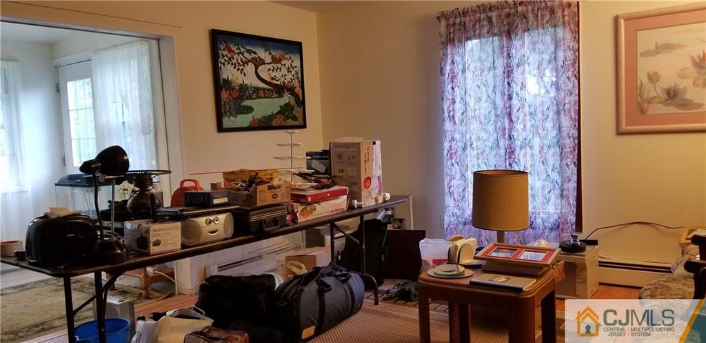 901 A Hermann Road North Brunswick, NJ 08902 - Photo 4 of 21 a room with furniture and wooden floor