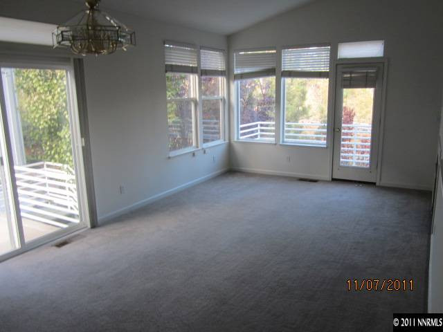 629 Caughlin Glen Reno, NV 89519 - Photo 3 of 8 an empty room with windows