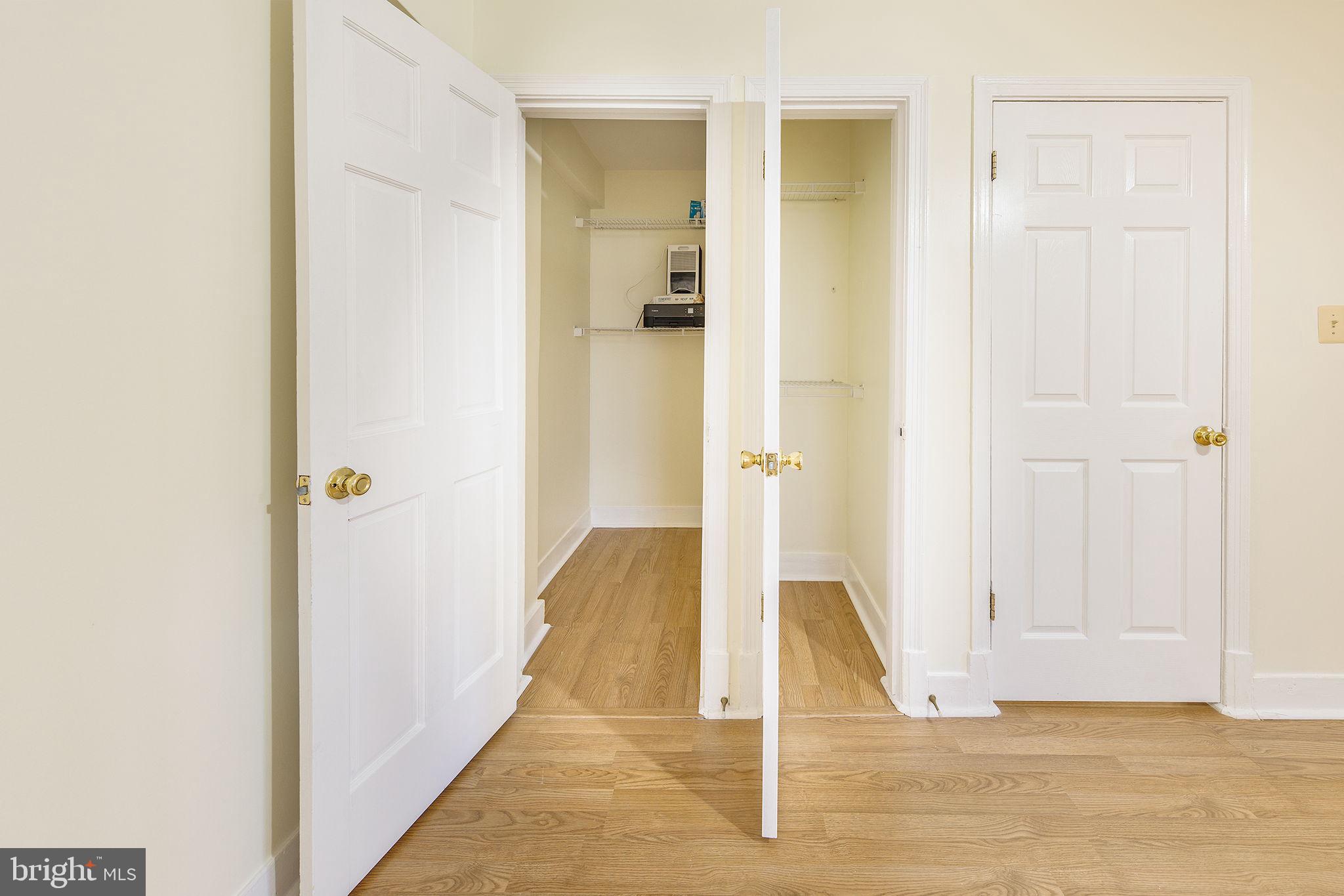 1446 Tuckerman Street Northwest, Unit A6 Washington, DC 20011 - Photo 14 of 25 a view of a hallway with wooden floor and entryway
