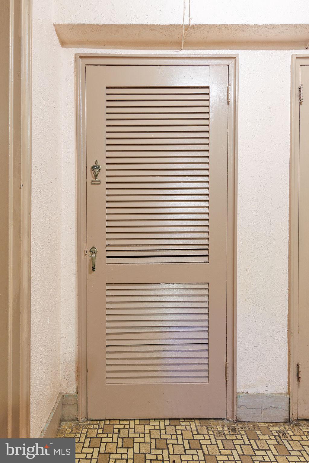 1446 Tuckerman Street Northwest, Unit A6 Washington, DC 20011 - Photo 20 of 25 a view of a door and a window